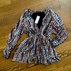 Boutique romper, long sleeves, animal print size Large.